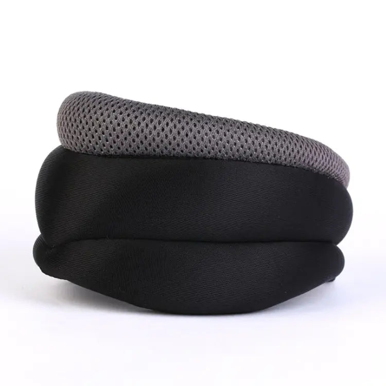 Black and gray neck pillow on a white background