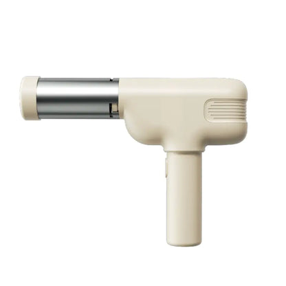 Beige handheld vacuum cleaner on a white background