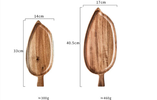 Two wooden spoons with measurements and weight labels on a white background