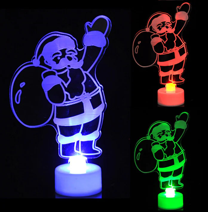 Color-changing LED Santa Claus figure on a black background