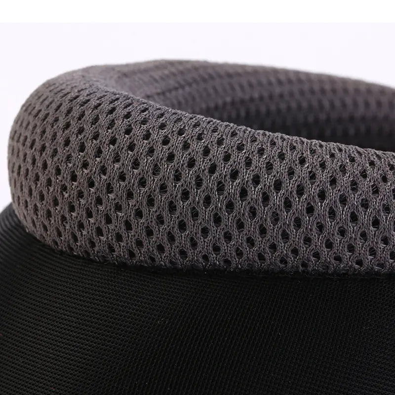 Close-up of a black headband with a textured gray band on a white background